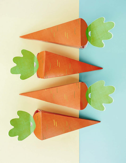 Mise en scène de quatre boîtes carottes en carton