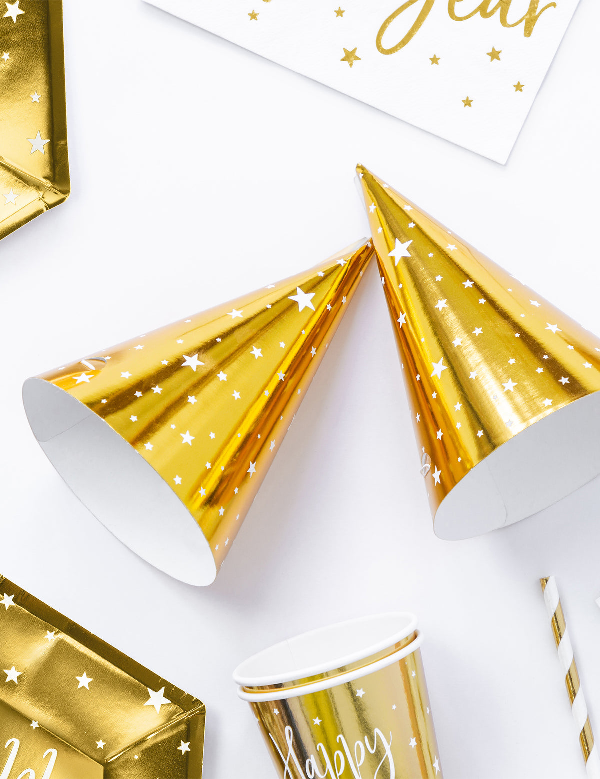 Chapeaux de fête étoiles blanches pour anniversaire dorés