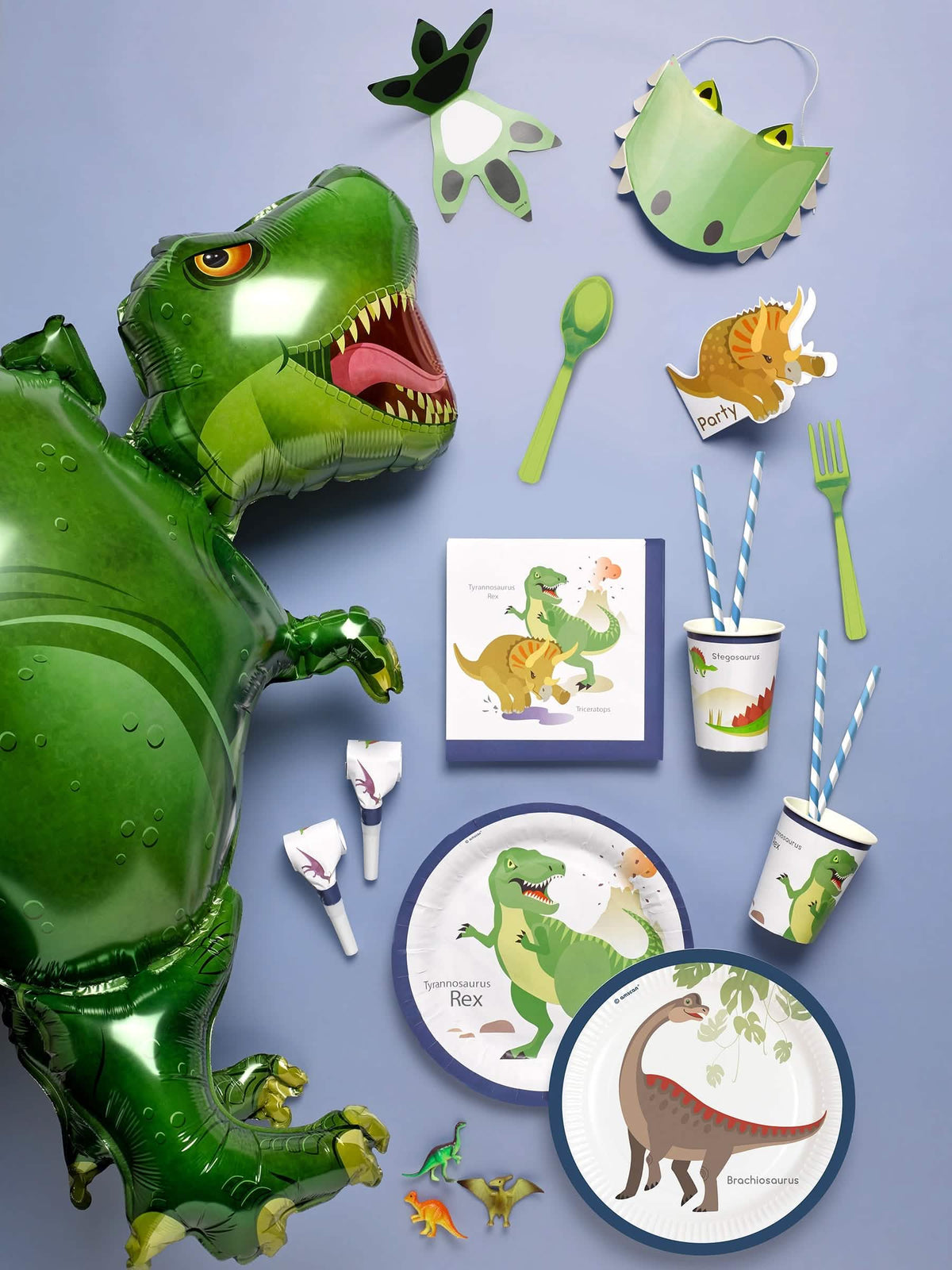 Puesta en escena de las mini figuras de dinosaurios para piñata