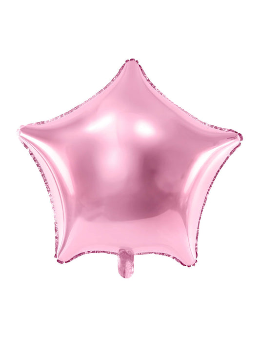 Mise en situation dans un décor d'anniversaire du ballon aluminium étoile rose pastel