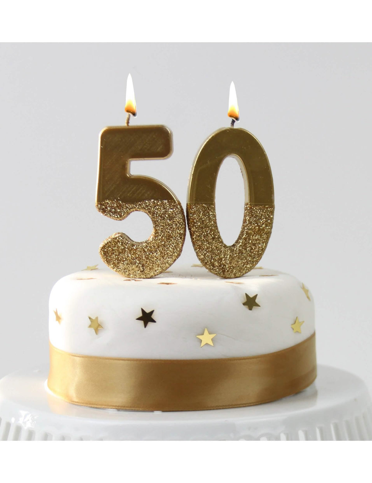 Decoración para tarta con vela sobre palillo con número dorado y con purpurina
