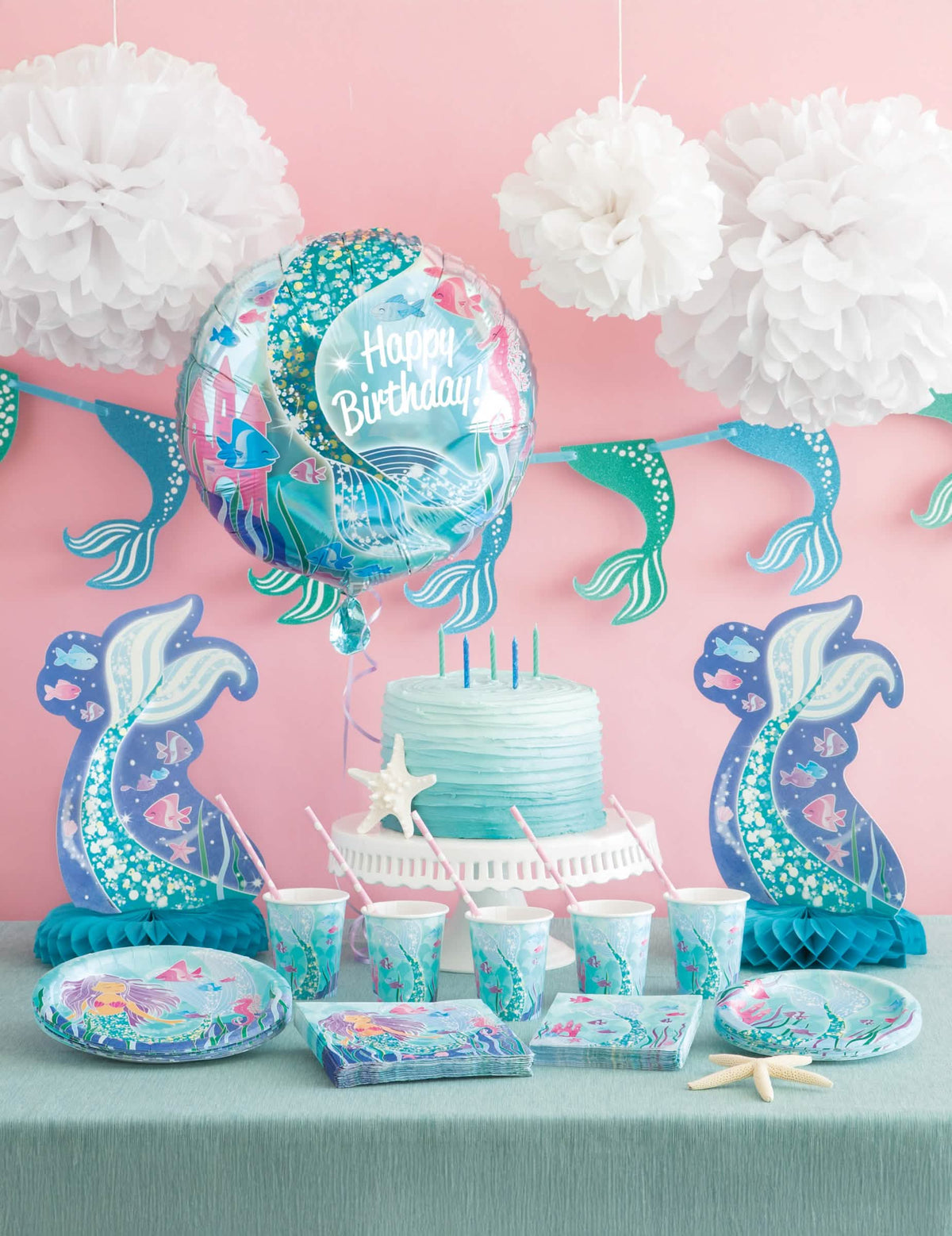 Ambientación en una decoración de cumpleaños para el centro de mesa linda sirenas