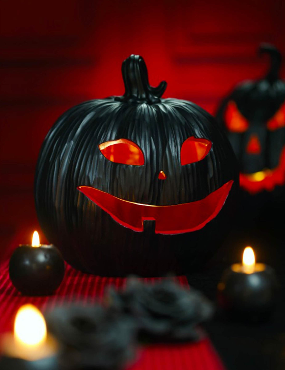 Calabaza decorativa de resina negra y roja con LED 25 x 24 x 25 cm