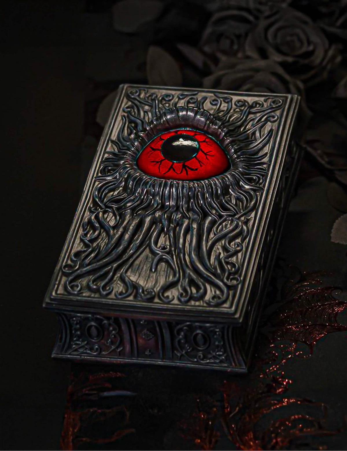 Libro decorativo de resina con ojo rojo sangre 20 cm