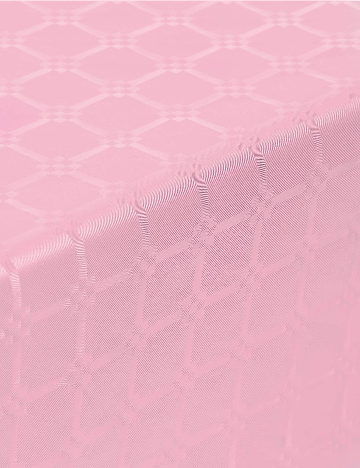 Detalle de los motivos del mantel en rollo de papel damasco rosa pastel