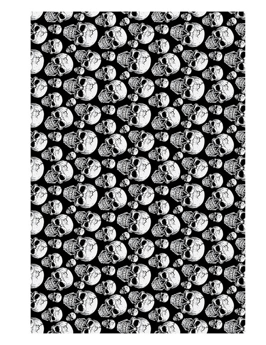 Nappe tête de mort noir et blanc avec motifs de crânes