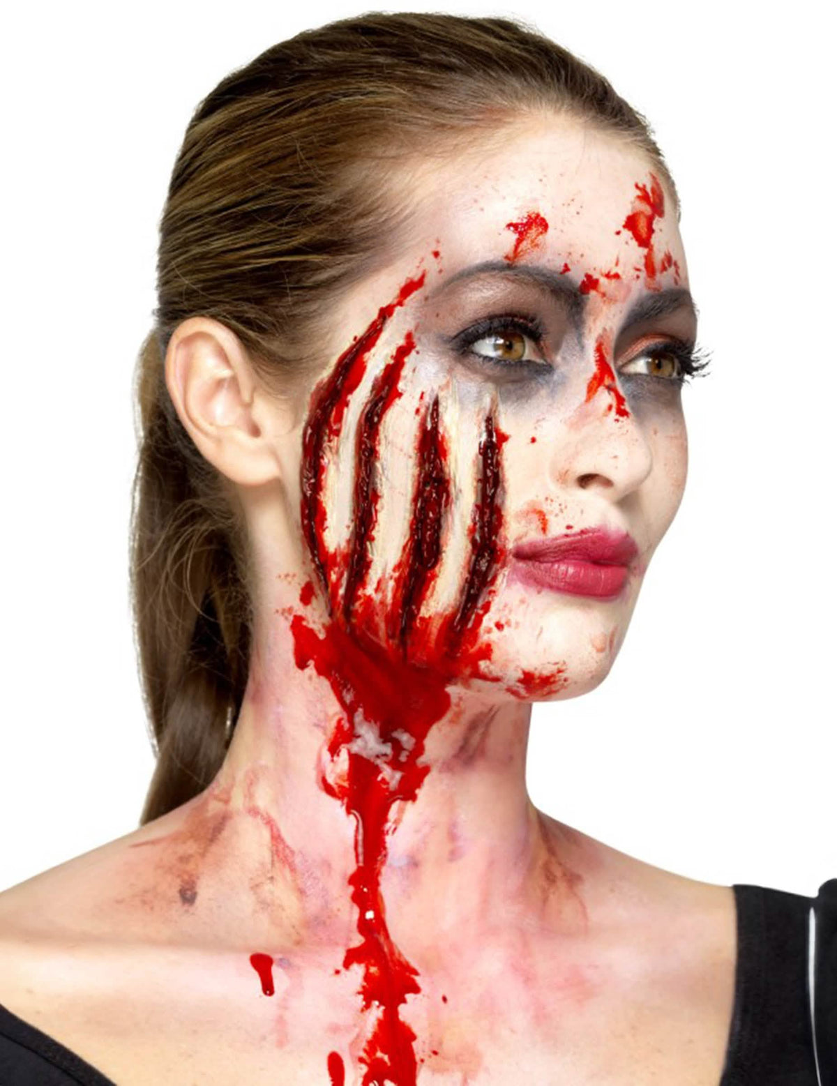 Vista de tres cuartos de la prótesis de látex con cortes halloween