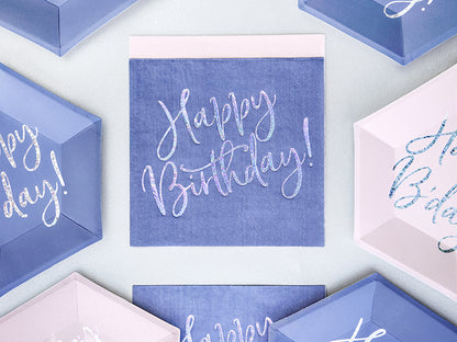 Mise en scène des serviettes en papier Happy Birthday iridescent pour anniversaire
