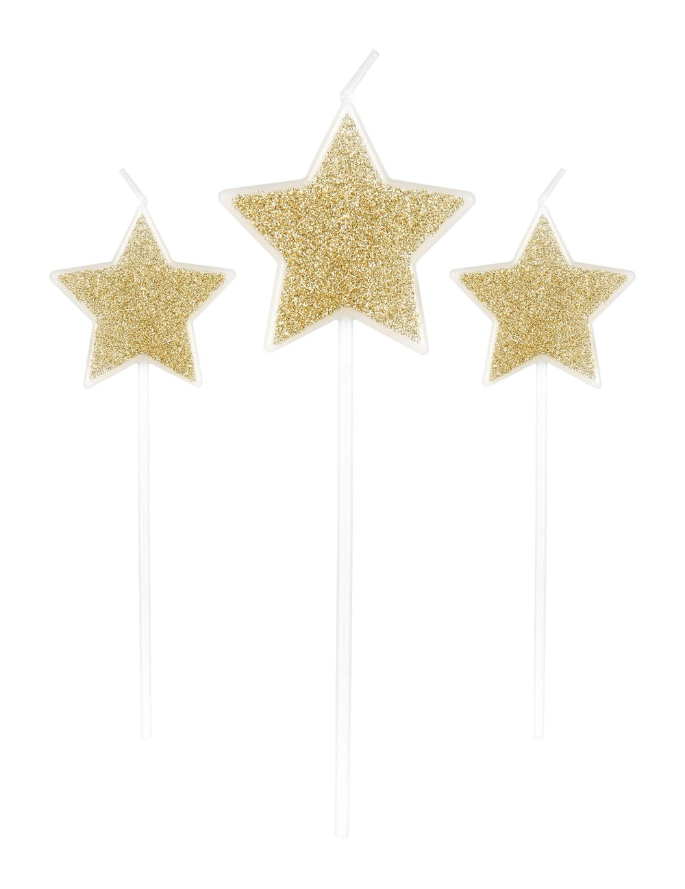 3 bougies sur pic étoiles pour fête paillettes champagne