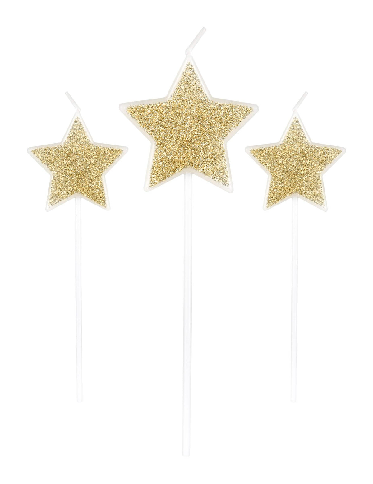 3 bougies sur pic étoiles pour fête paillettes champagne