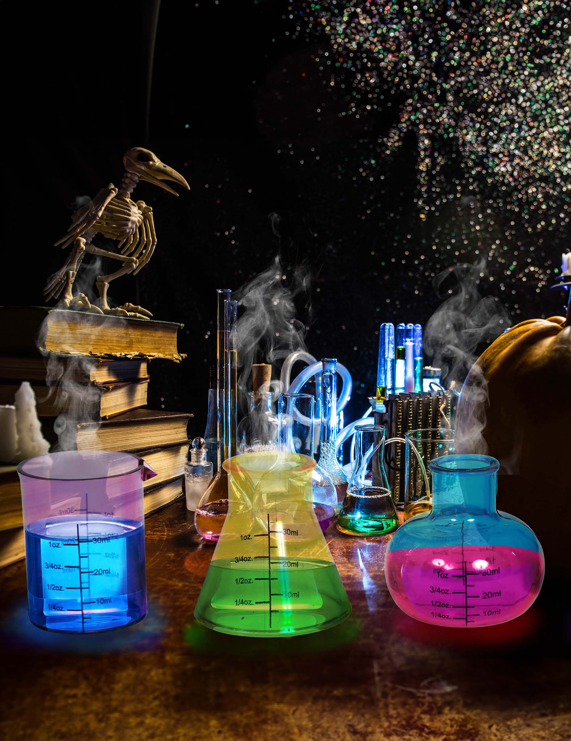 Mise en scène des faux béchers de laboratoire pour fête multicolores