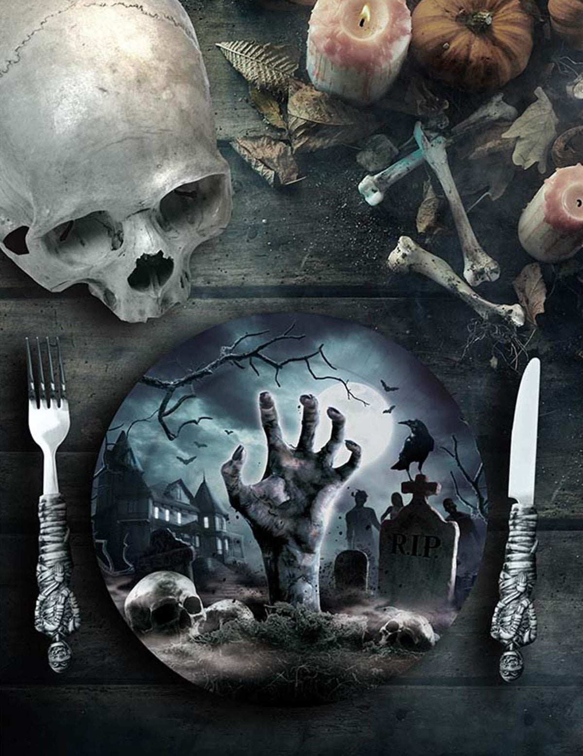Mise en scène avec couverts et crânes des assiettes revenants du cimetière