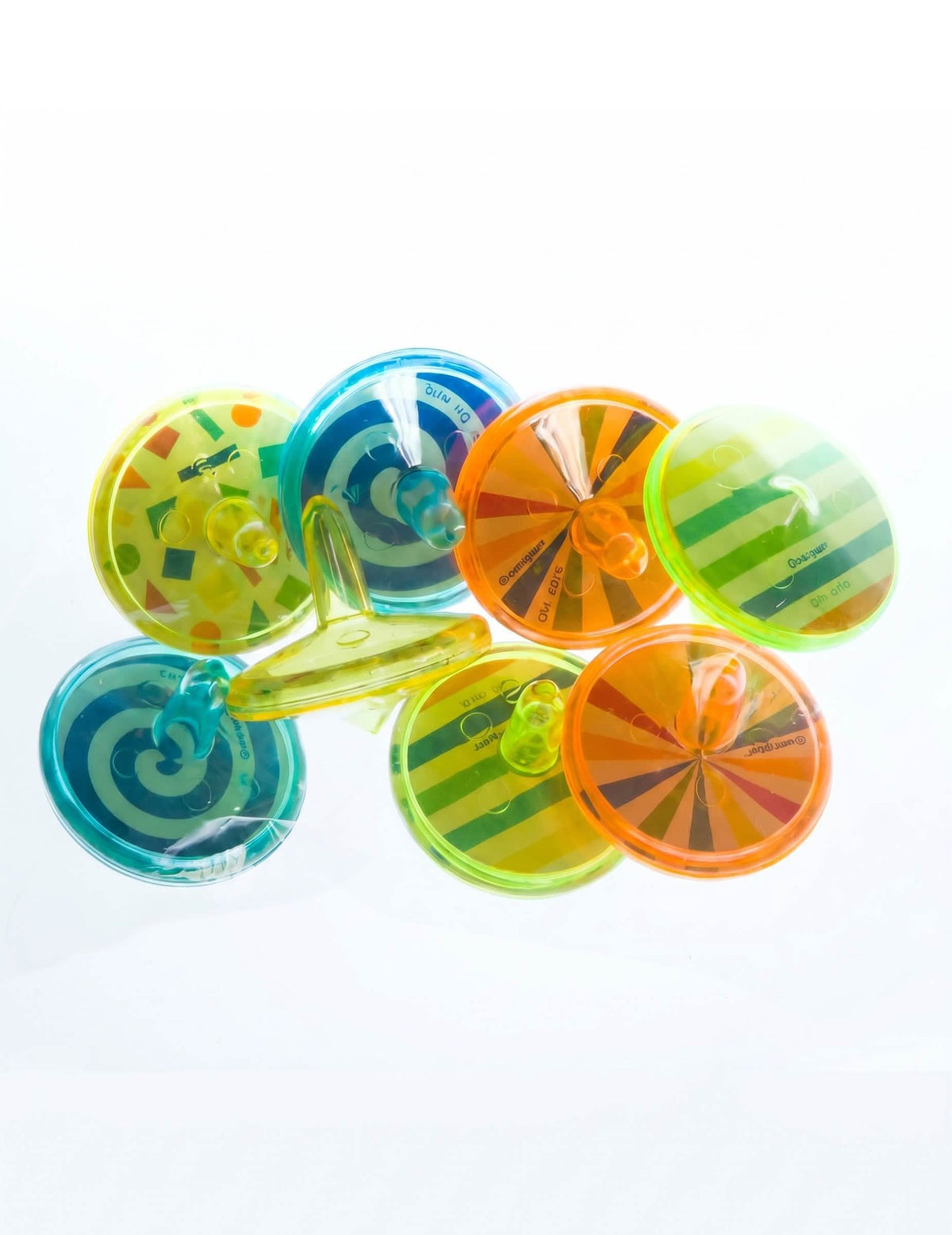 8 accesorios para piñata: peonzas de plástico con motivos en espiral