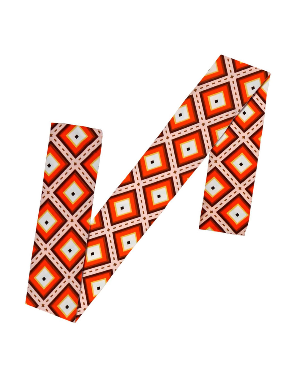Vista del accesorio en plano de la diadema de los años 70 con motivos de rombos