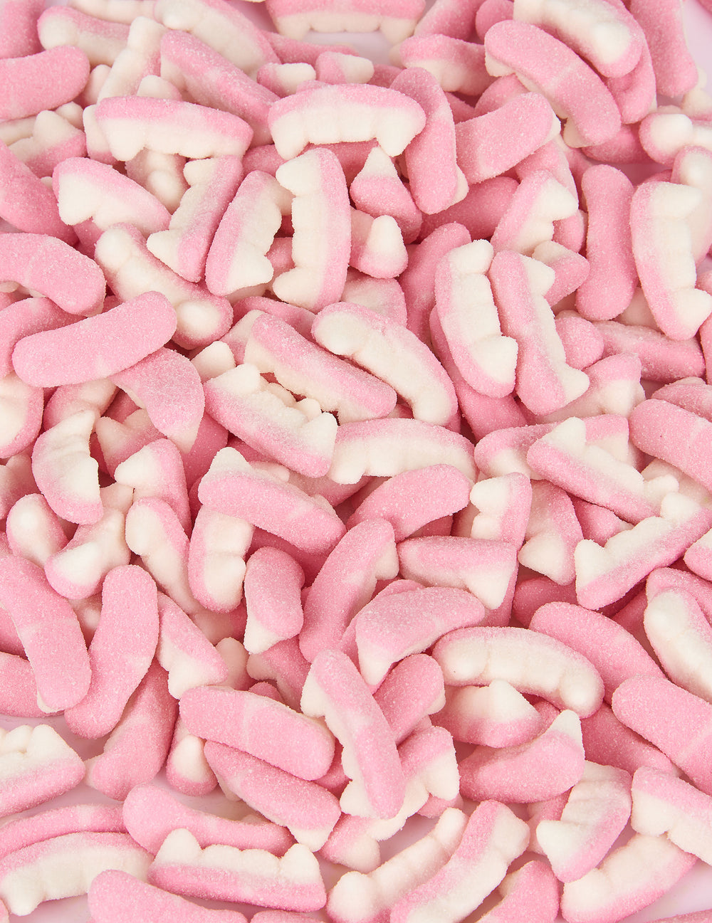 Bonbons dents de vampire Haribo pour Halloween roses et blancs
