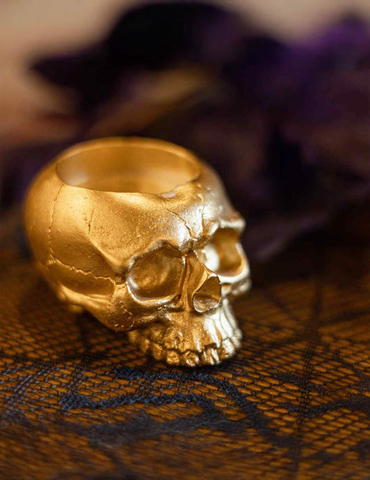 Portavelas de calavera de resina dorada 8 x 6 cm
