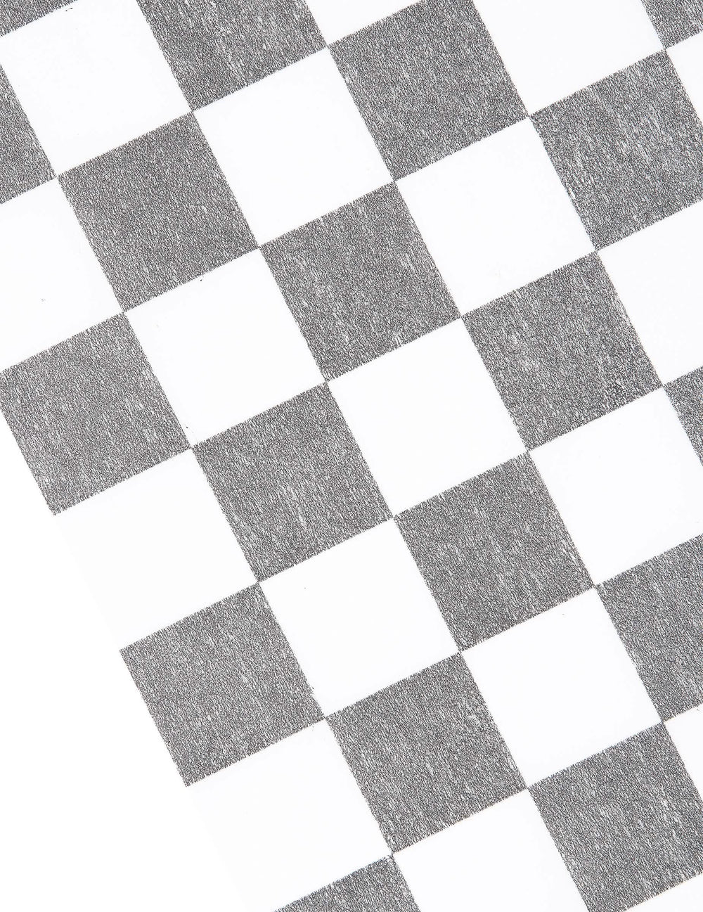 Détail du motif du chemin de table intissé damier