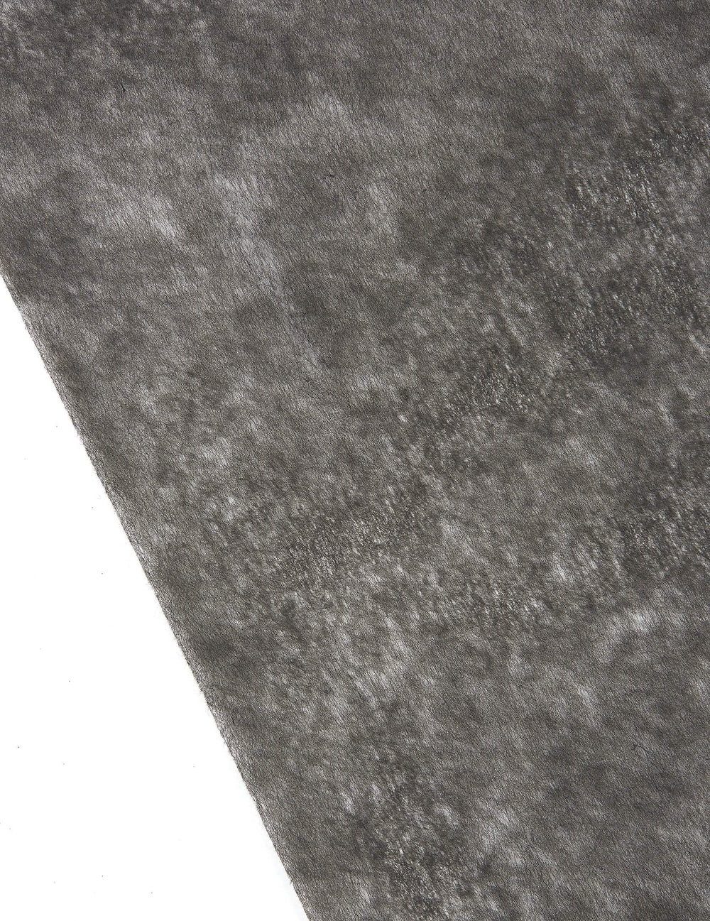 Gros plan sur la texture du chemin de table intissé pour décoration de fête noir