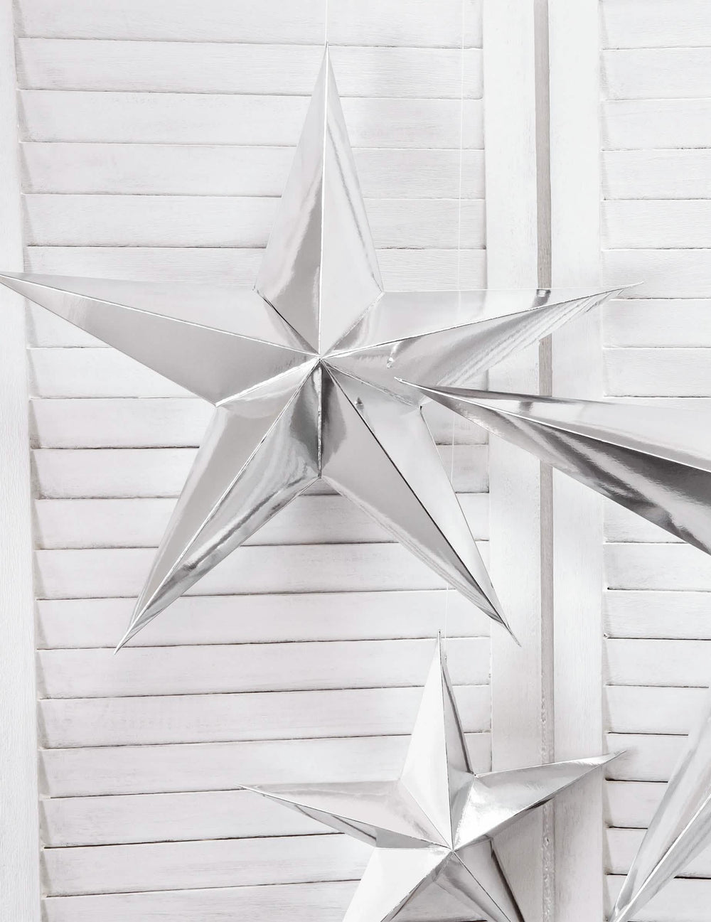 Mise en scène de la décoration à suspendre étoile pour Noël