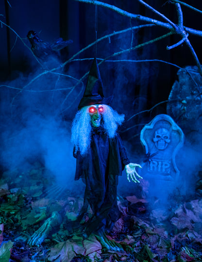 Décoration de sorcière animée lumineuse et parlante pour Halloween noire et verte avec yeux rouges