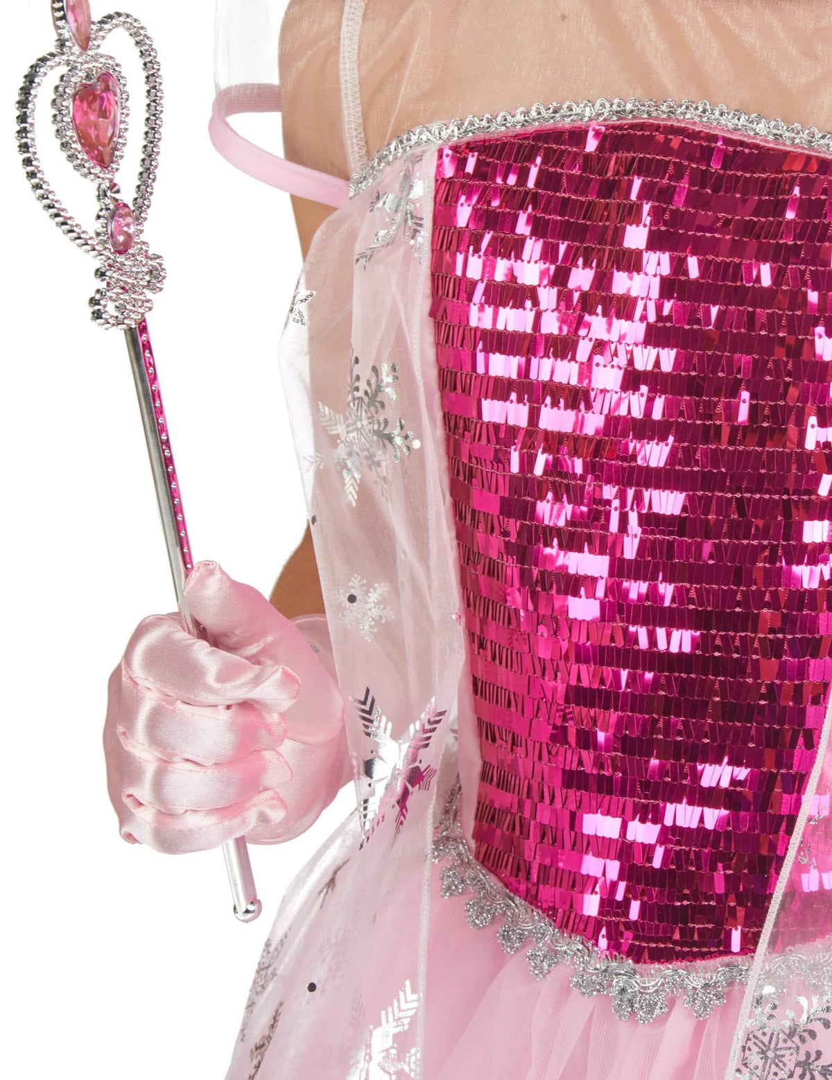 Detalle del cetro y del bustier con lentejuelas del disfraz y accesorios de princesa