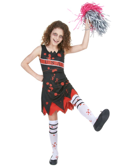 Vue de face avec jambe levée du déguisement de pompom girl zombie pour fille