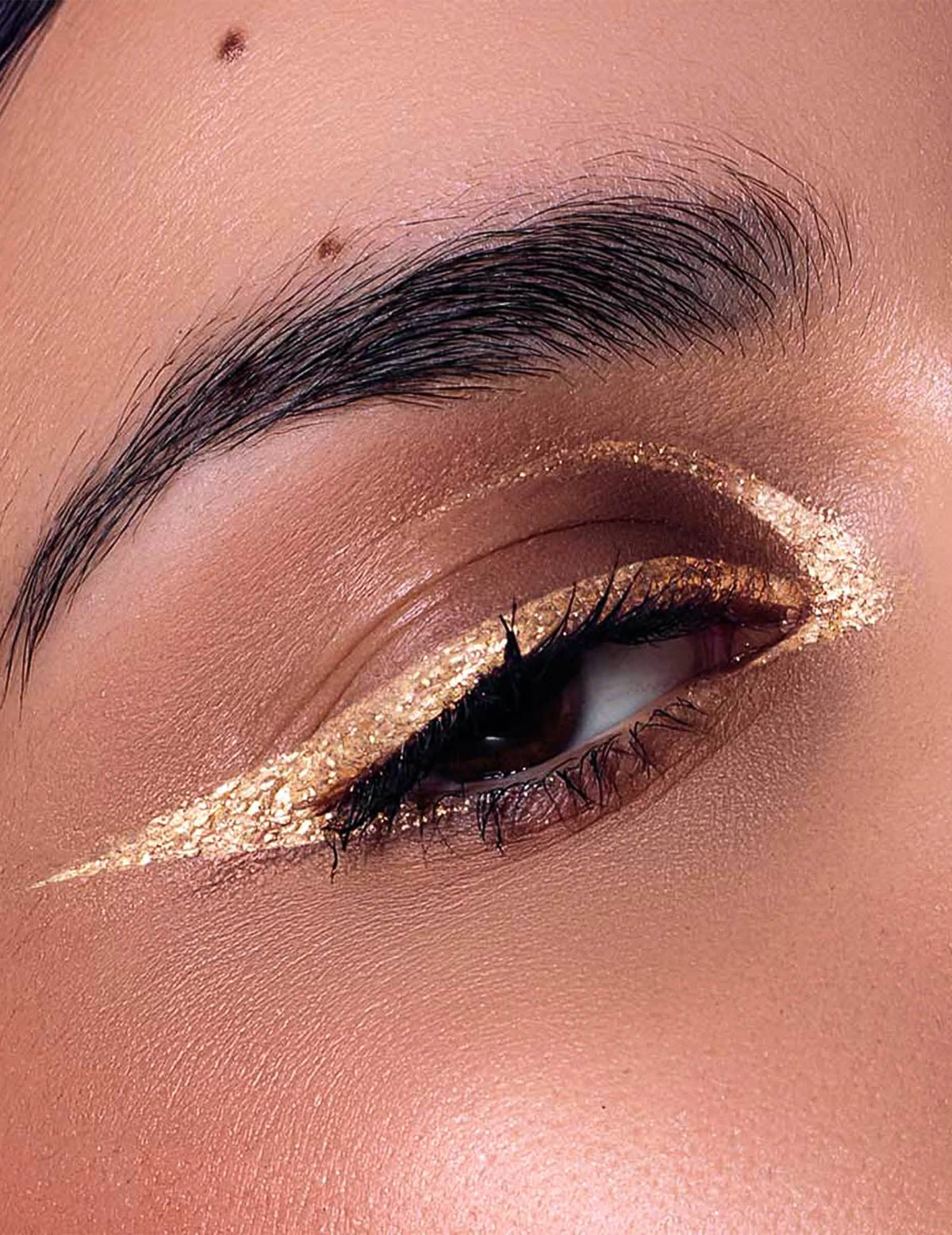Eyeliner con purpurina oro metálico Si si la paillette™