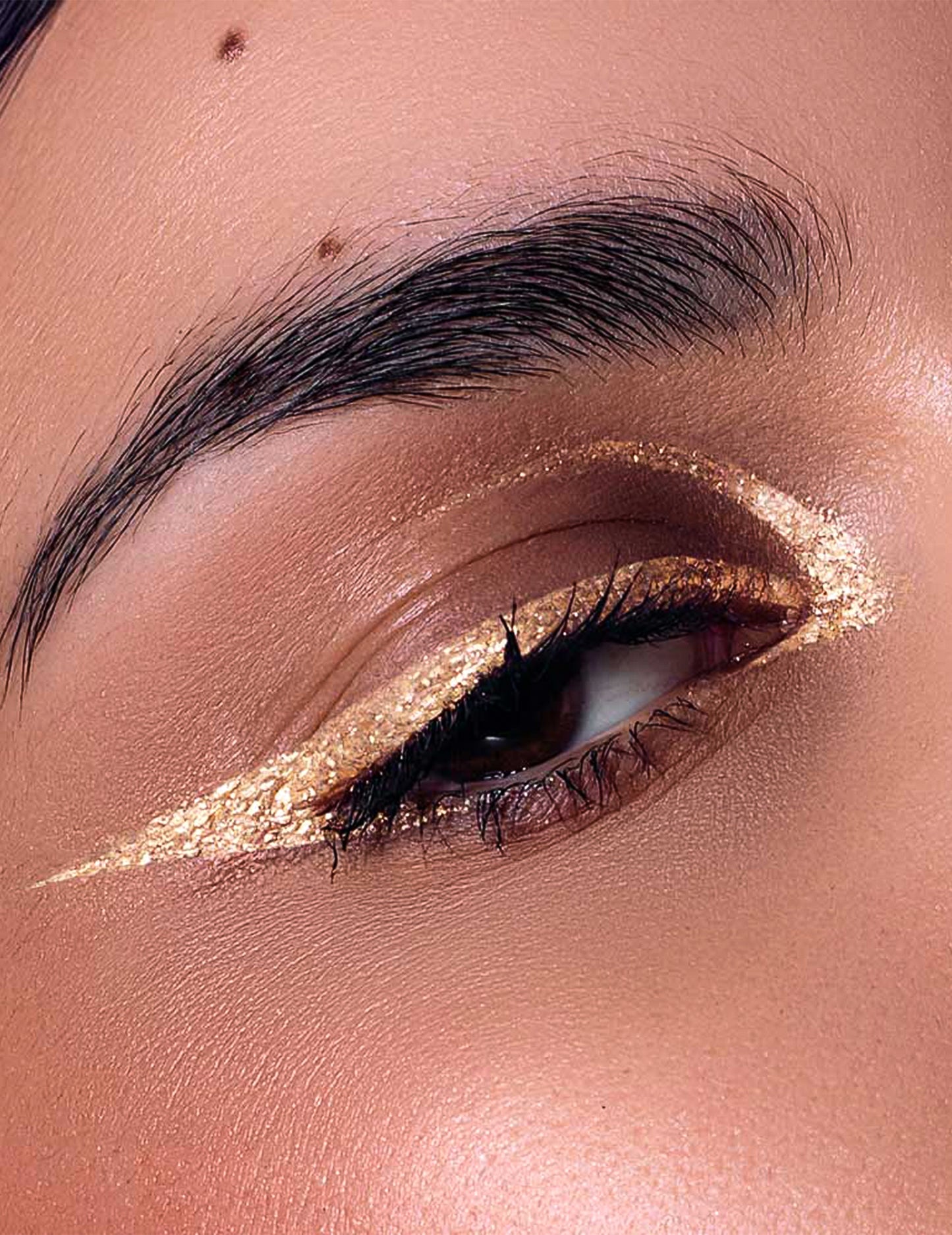Eyeliner con purpurina oro metálico Si si la paillette™