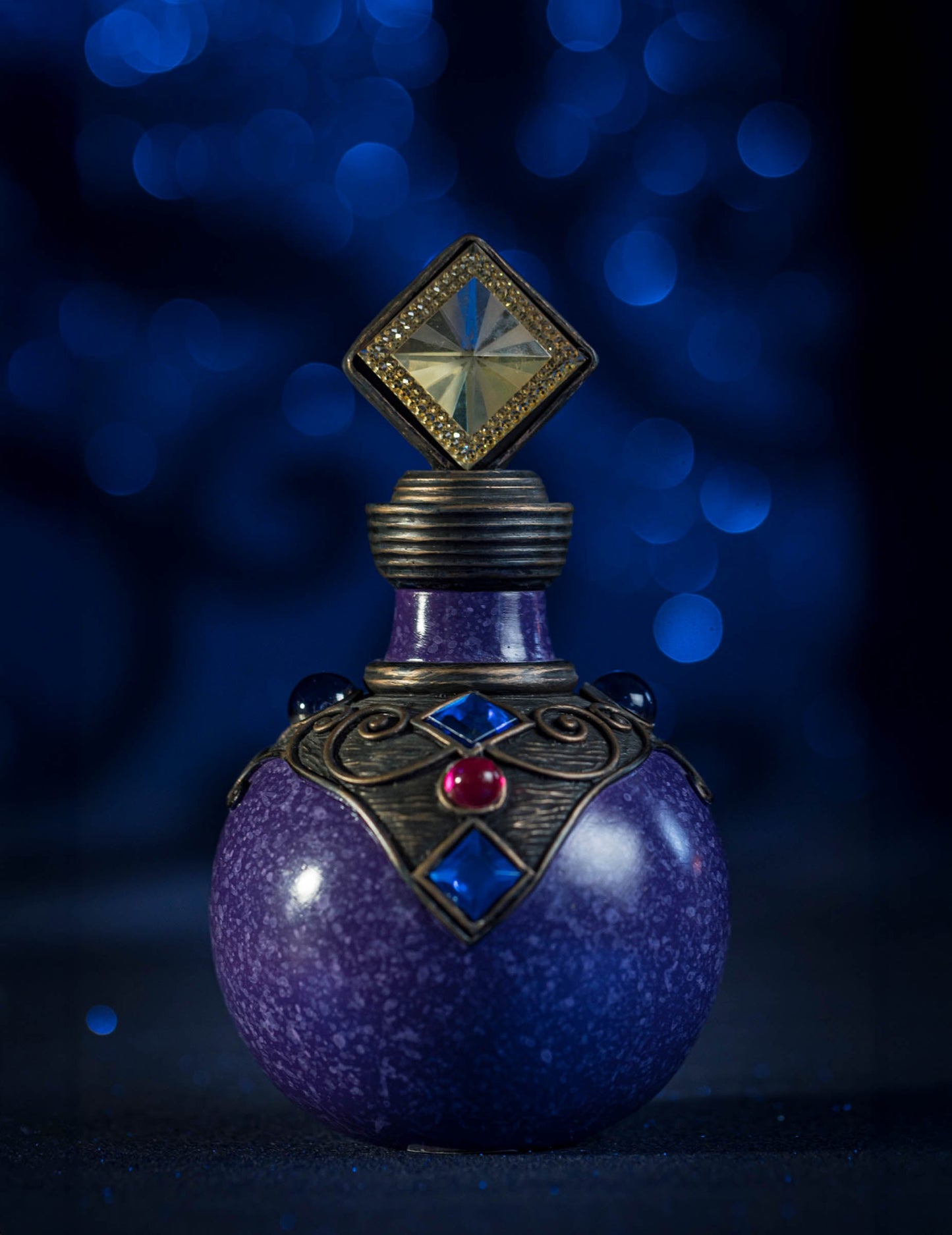 Botella de poción morada 16,5 cm de resina