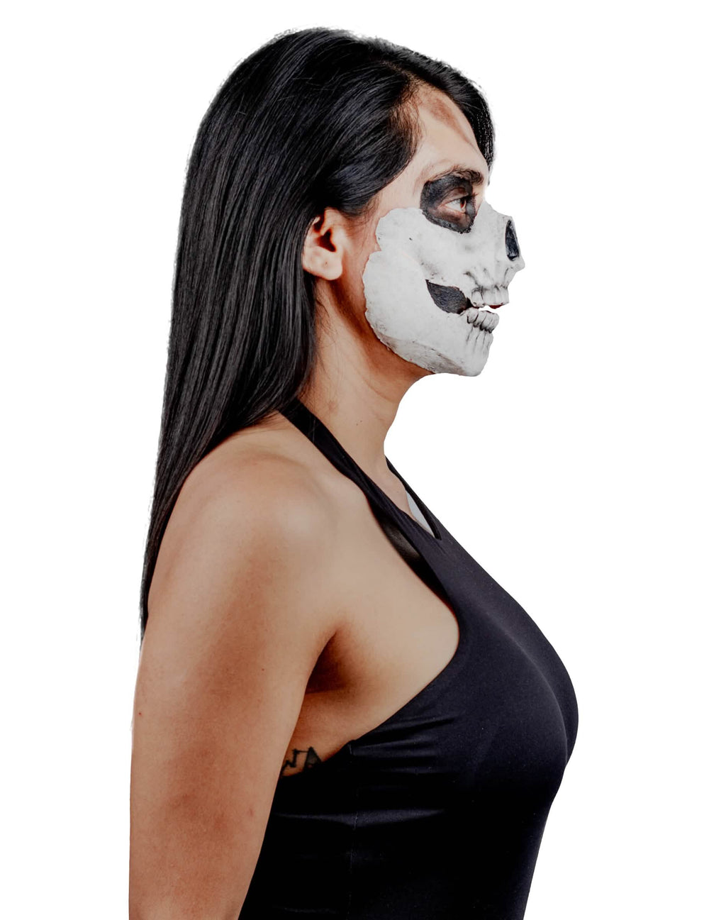 Vista de perfil del maquillaje esqueleto