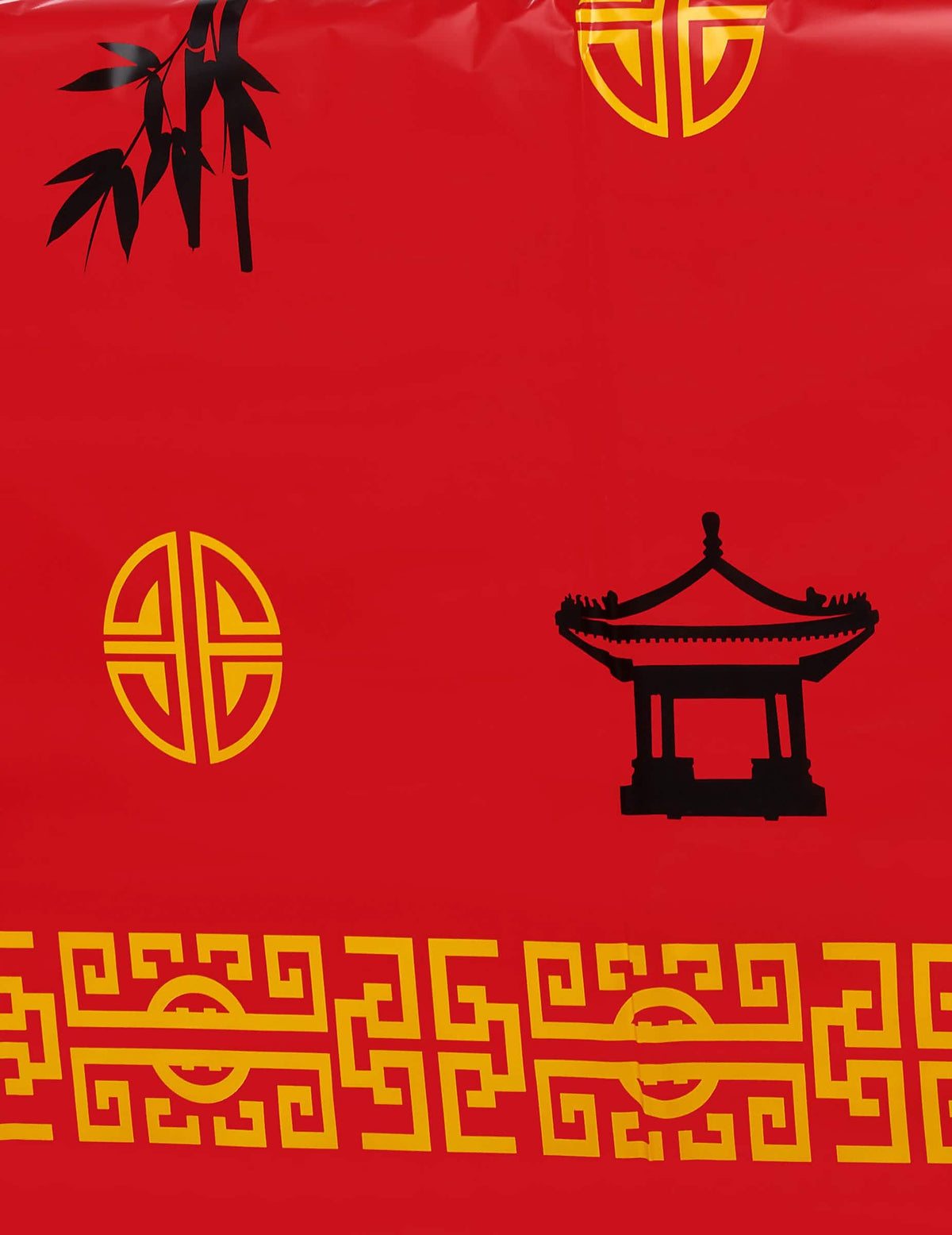 Detalle de los estampados de pagoda y bambú del mantel de plástico asia