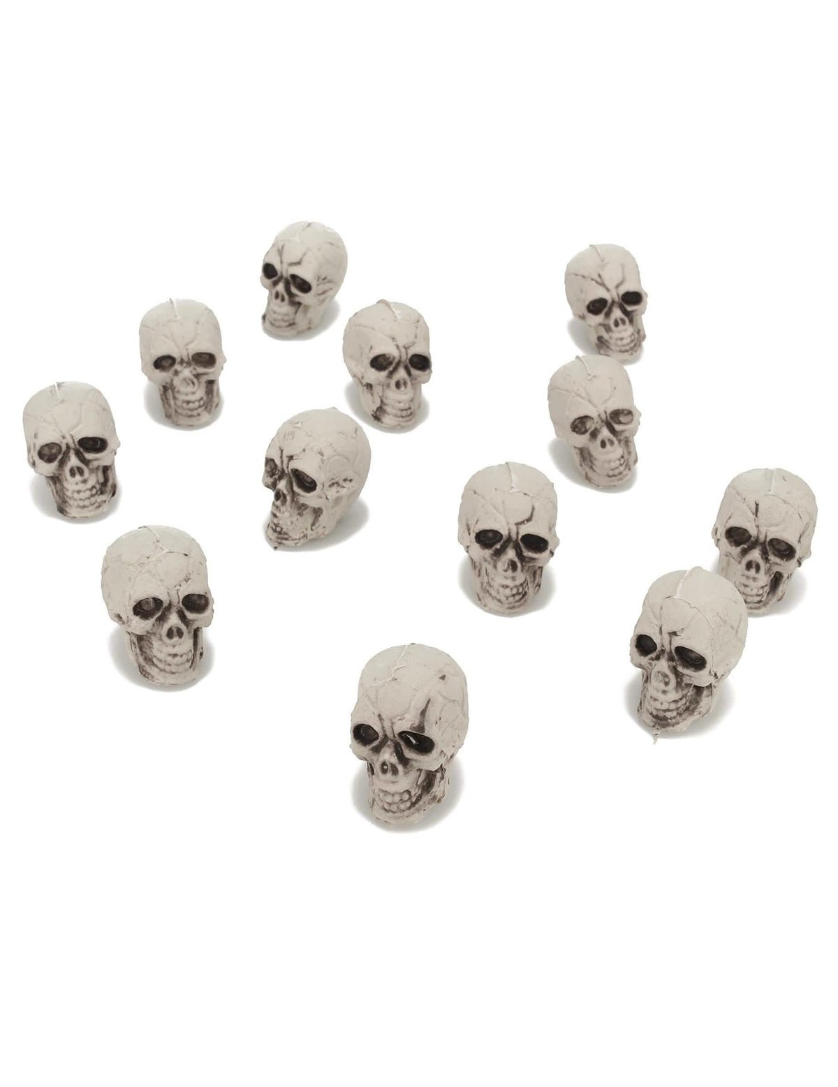 12 pequeñas calaveras para decoración en plástico blanco roto